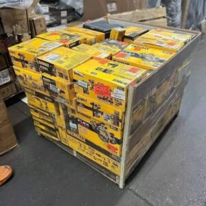 Pallet loaded with yellow DeWalt power tool boxes wrapped in plastic in a warehouse setting
